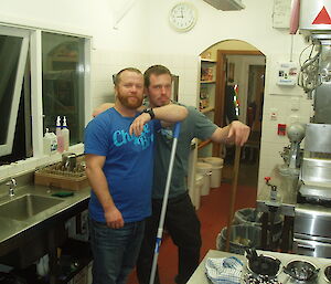 Greg and Jarrod take a break from mopping the kitchen after dinner to pose for the camera
