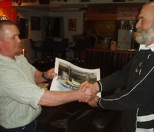 Chris presents boating officer Pete with the award for "Most patient TASPWS support crew"