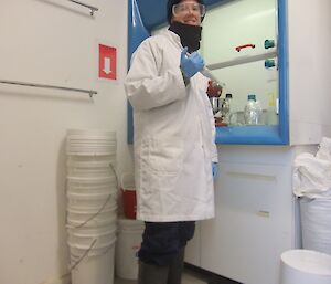 Ingrid spiking soil samples in the laboratory fume hood