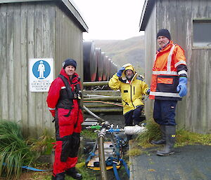 Station refuelling: watercraft operator Adrian and incoming dieso Lionel and outgoing dieso Pete