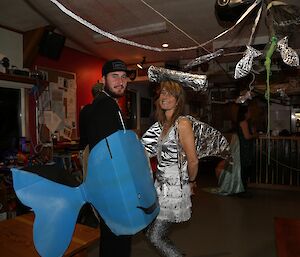 cardboard whale and foil shark costumes