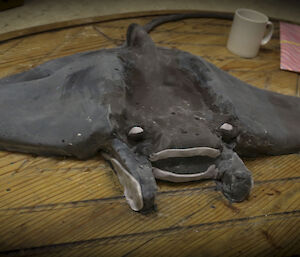 Large cake with a fondant manta ray on top