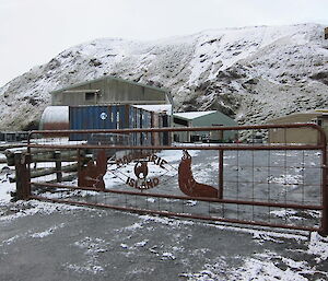 The Macca station gate with snowy hill in the rear