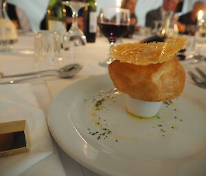 Sauteed escargot with roast garlic, parmesan and a sourdough roll