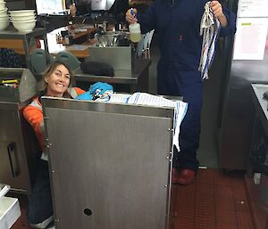 Jacque and Justin cleaning the oven