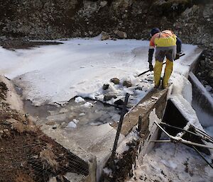 Ben clearing the ice from around the intake