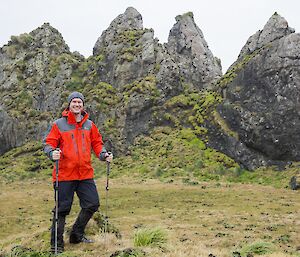 Rich standing in front of rock stacks