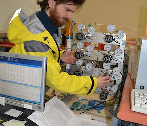 Dan calibrating the air sampling equipment