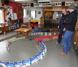 Mini golf course made of food boxes in mess