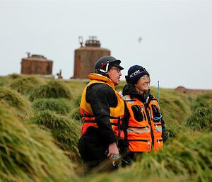 Chris and Jacque standing in tussock talking