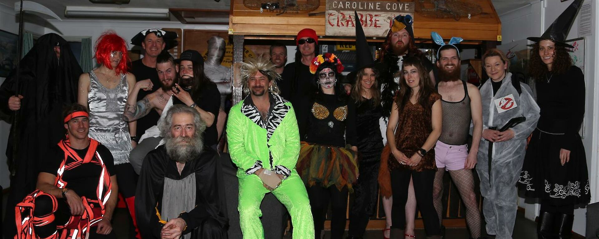 Group photo of expeditioners in costumes for halloween