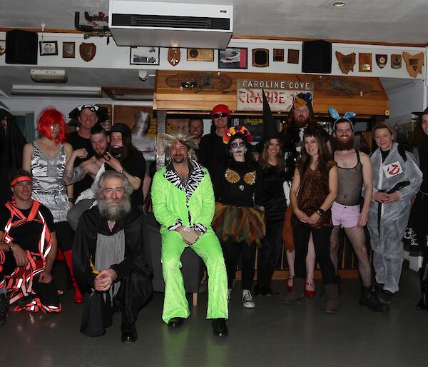 Group photo of expeditioners in costumes for halloween