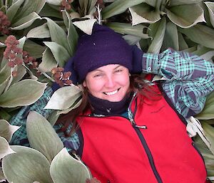 Kate in red vest in vegetation patch