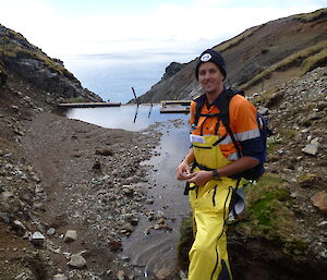 Summer plumber Tim at Gadgets Dam, filled with silt from the landslide.