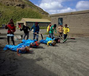 Expeditions some on the ground dressed as elephant seals