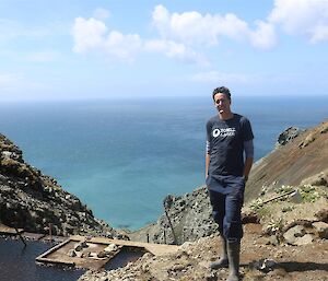 Tim A standing beside Gadgets dam with ocean in distance