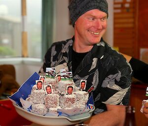 Rich carrying plate of lamingtons