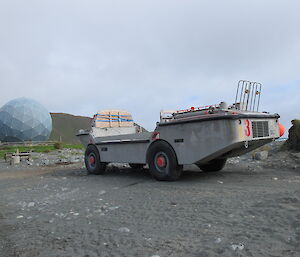 A LARC parked in front of the ANARESAT dome