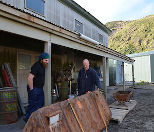 Jimmy and Nick outside the multi purpose building