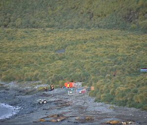 Shore party ready to help boats land and launch at landing beach.