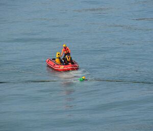 IRB team on the water tending the fuel line