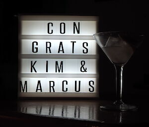A light box with the words ‘Congrats Kim and Marcus’ spelled out