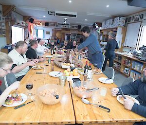 The Macca team enjoying their lamb feast in the mess.