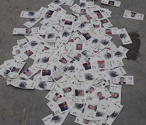 A pile of homemade money on the floor in a warehouse