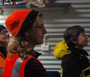 3 women watching something out of frame