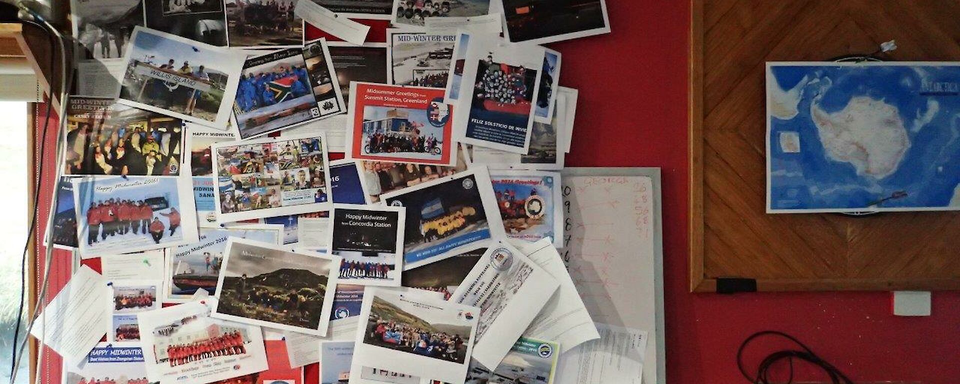 A pinboard covered in messages from other stations