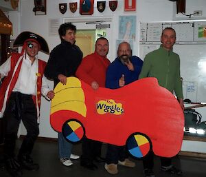 5 people dressed up as members of the Wiggles