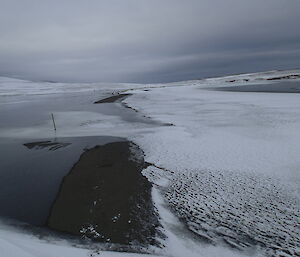 View south along the Island Lake Track at island Lake after the snow