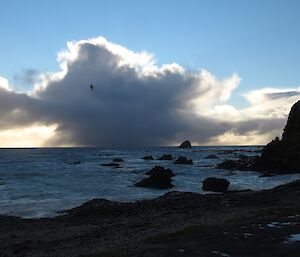 Clouds on the horizon backlit by the sun