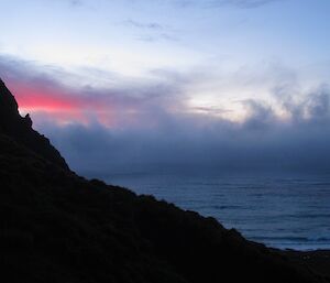 The pink sky of sunset over the west coast