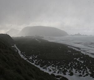 Snow on the beach looking back towards North Head