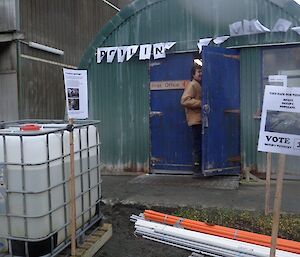 A man enters the building to vote