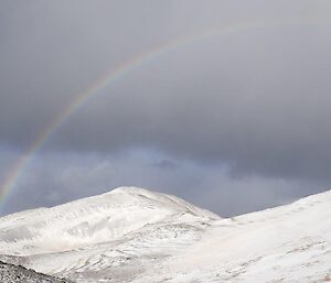 A rainbow over the snowy plateau