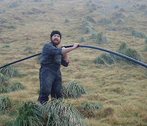 A man holding pipe