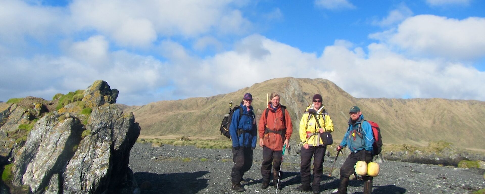 Group photo of four people ready to set out on northern giant petrel census