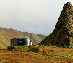 A picture of the Davis Point hut on a sunny afternoon