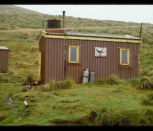 A picture of a more modern hut called Bauer Bay Hut in 1982