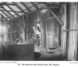 A picture of the interior of the Nuggets processing building in 1895, showing corrugated iron and machinery