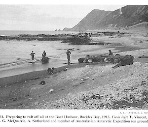 Men on the beach preparing to put barrels of oil and raft them at Buckles Bay in 1913