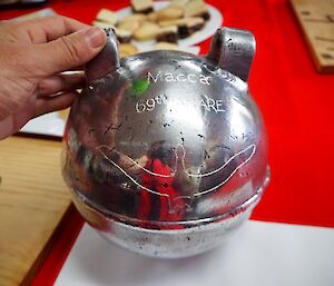 A polished up metal buoy