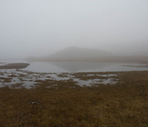 A photo showing a very wet Green Gorge tarn