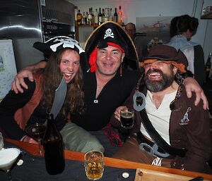 Three people dressed as pirates