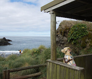 Fibreglass dog on the porch balcony