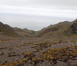 Looking down on Lusi Bay from the track with pillow lava stacks in foreground — approx 300m above sea level.