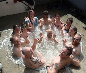 A very crowded spa bath with all of the expeditioners that had gone into the sea for a swim