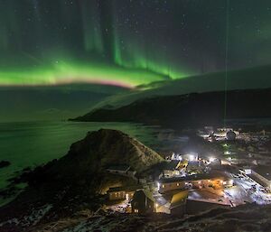 An aurora in the night sky over station